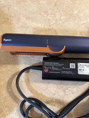 Dyson navy and copper hair straightener